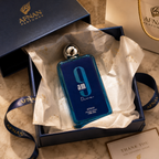 Afnan 9AM Dive luxury men's perfume displayed in sophisticated Dubai-inspired luxury lifestyle scene.