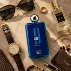 Premium long-lasting men's fragrance Afnan 9AM Dive in stylish blue glass bottle with metallic cap.