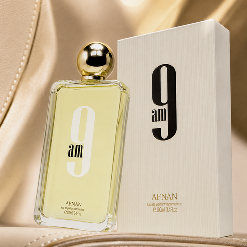 Close-up view of Afnan 9 AM Eau de Parfum showcasing premium glass bottle, gold cap, and luxury finishing details.
