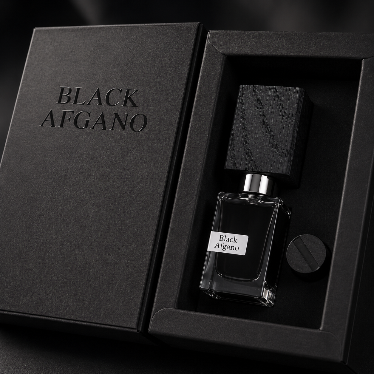 Close-up of Black Afgano perfume bottle showcasing premium materials, luxury craftsmanship, texture, and elegant finishing.