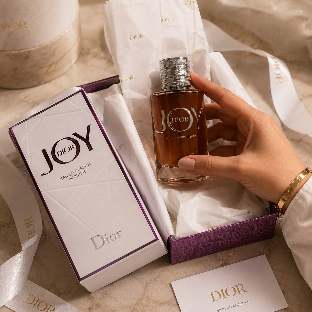 Premium flatlay featuring Dior Joy perfume with sunglasses, jewelry, watch, and luxury leather accessories