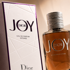 Close-up macro photography of Dior Joy Eau De Parfum Intense showcasing luxury bottle texture and premium detailing
