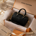 Elegant woman holding luxury black handbag in premium UAE fashion lifestyle setting