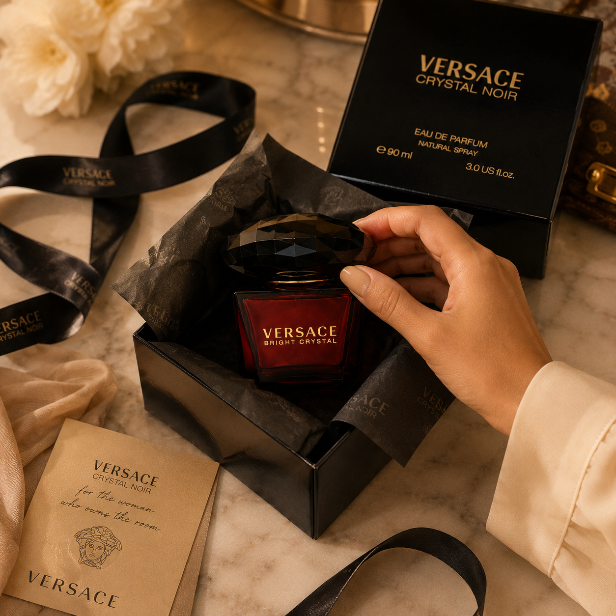 Luxury perfume presented in premium gift packaging with tissue paper, ribbon, and elegant unboxing presentation for luxury gifting.
