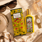 Luxury flatlay featuring Gucci Flora Gorgeous Orchid perfume with sunglasses watch jewelry handbag and premium fashion accessories
