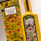 Close-up view of Gucci Flora Gorgeous Orchid perfume showcasing premium bottle finish floral artwork and luxury packaging details