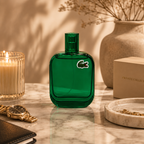 Lacoste L.12.12 Vert men's perfume displayed on marble surface with luxury accessories and premium editorial styling