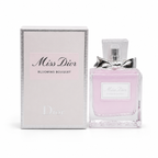 Luxury floral eau de parfum for women with elegant pink bottle and premium gift box on white background