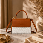 Luxury designer handbag displayed on marble surface with beige tones, elegant shadows, and sophisticated editorial fashion styling.