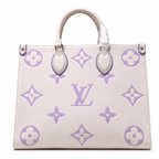 Designer handbag with purple monogram pattern on a white background