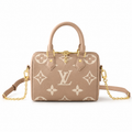 Beige luxury monogram mini handbag with gold chain strap on white background