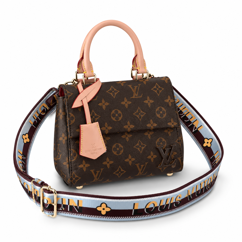 Luxury women’s monogram handbag with premium shoulder strap and elegant top handle on white background