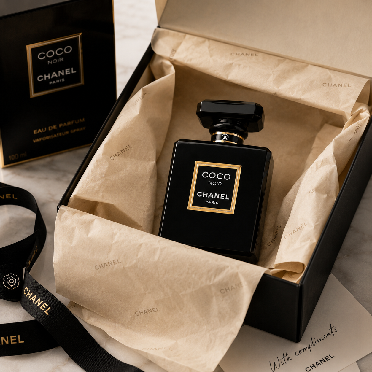 Premium black Eau de Parfum presented in an elegant luxury gift box with tissue paper and ribbon, creating a high-end unboxing experience.
