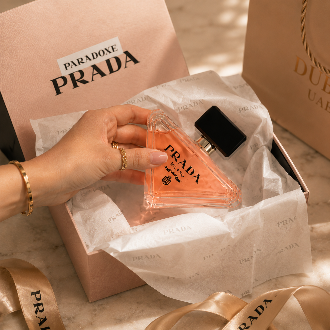 Luxury women's perfume presented in premium gift box with tissue paper and elegant ribbon for a high-end unboxing experience