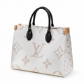 Elegant luxury women’s monogram tote bag with black handles and premium textured finish on clean white background.
