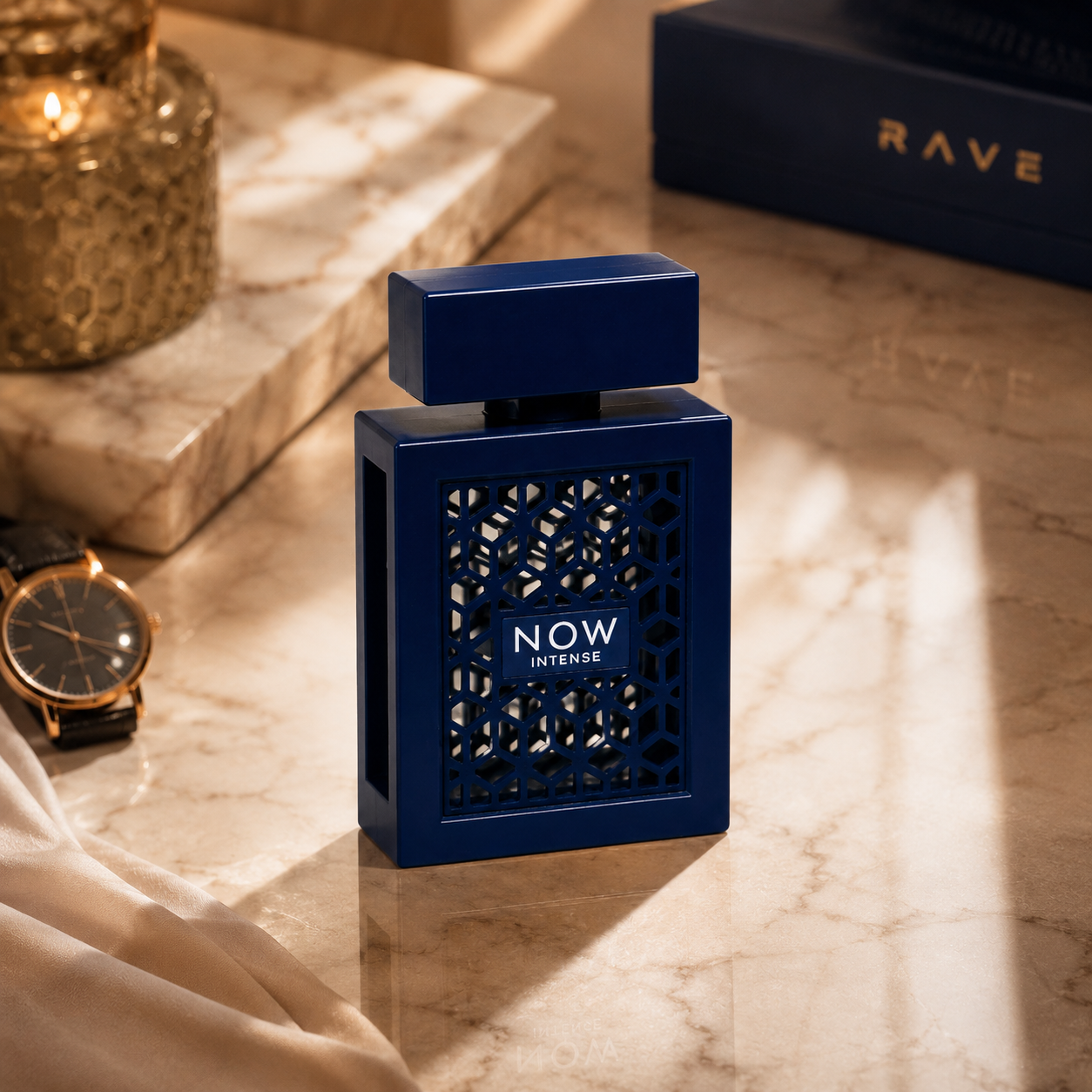 NOW Intense men's fragrance showcased on marble surface with luxury accessories and sophisticated editorial styling