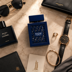 NOW Intense Eau De Parfum arranged with luxury watch, sunglasses, jewelry and leather accessories in premium flatlay composition