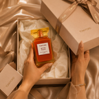 Tom Ford Bitter Peach Eau De Parfum presented in luxury gift packaging with premium tissue paper and ribbon during unboxing
