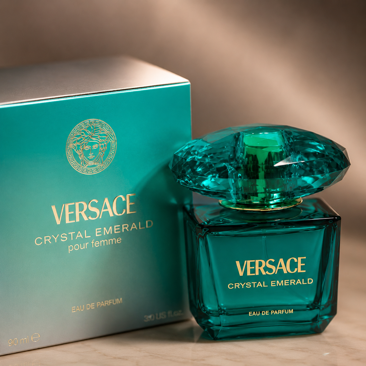 Close-up view of Versace Crystal Emerald perfume bottle highlighting premium glass craftsmanship and luxury detailing.